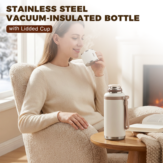 Botella de acero inoxidable con aislamiento al vacío y taza con tapa